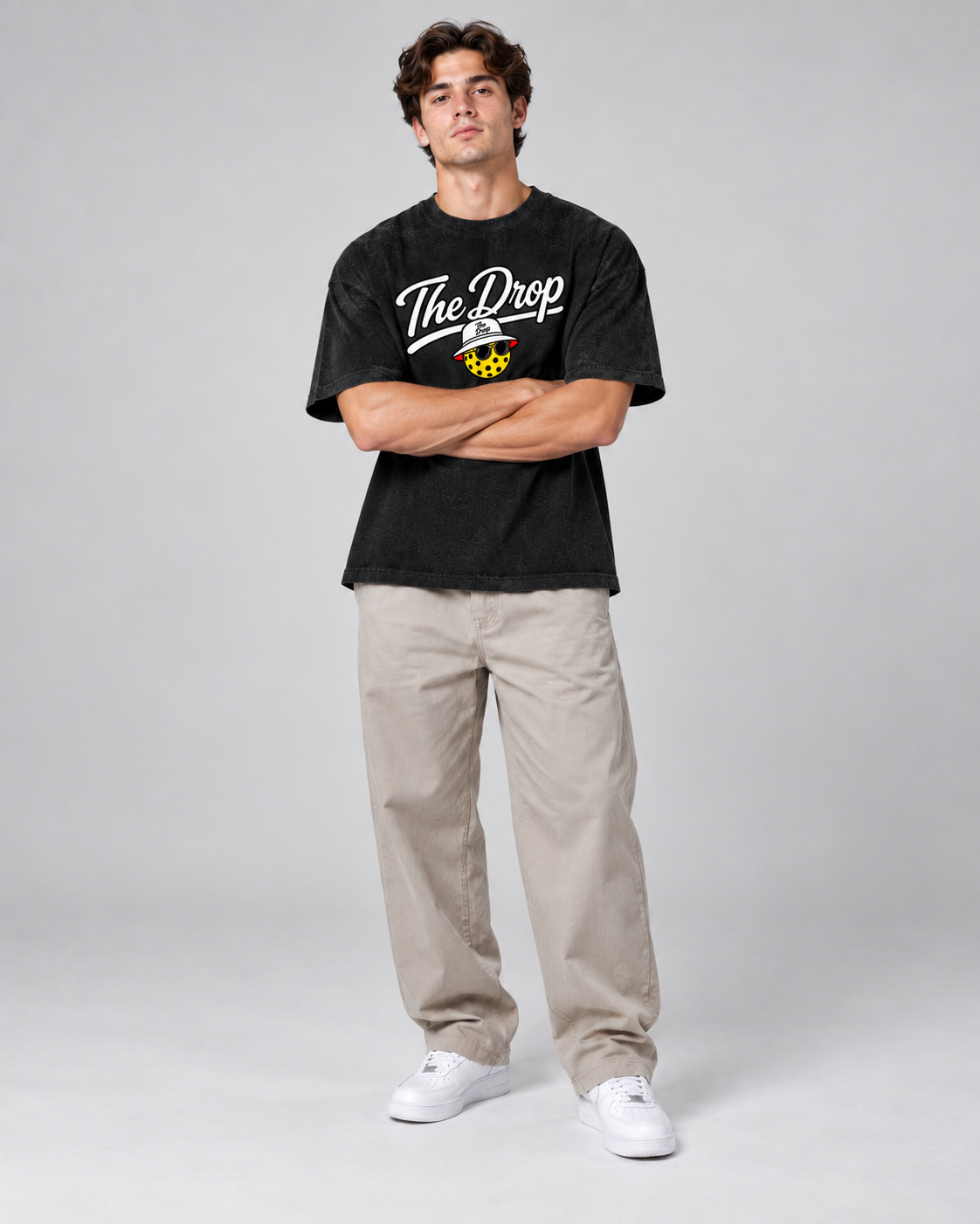 The Drop Black Tee — single model front view