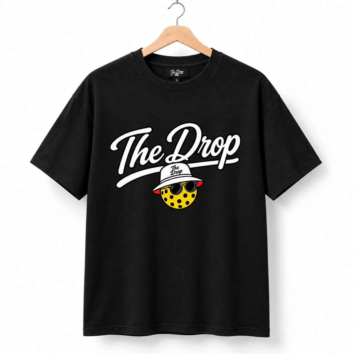 The Drop Black Tee — studio front view