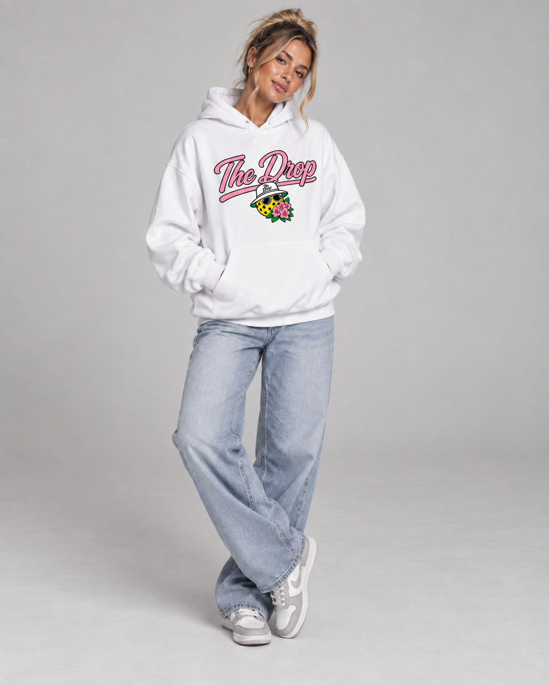 The Drop White Hoodie with pink script — single model front view