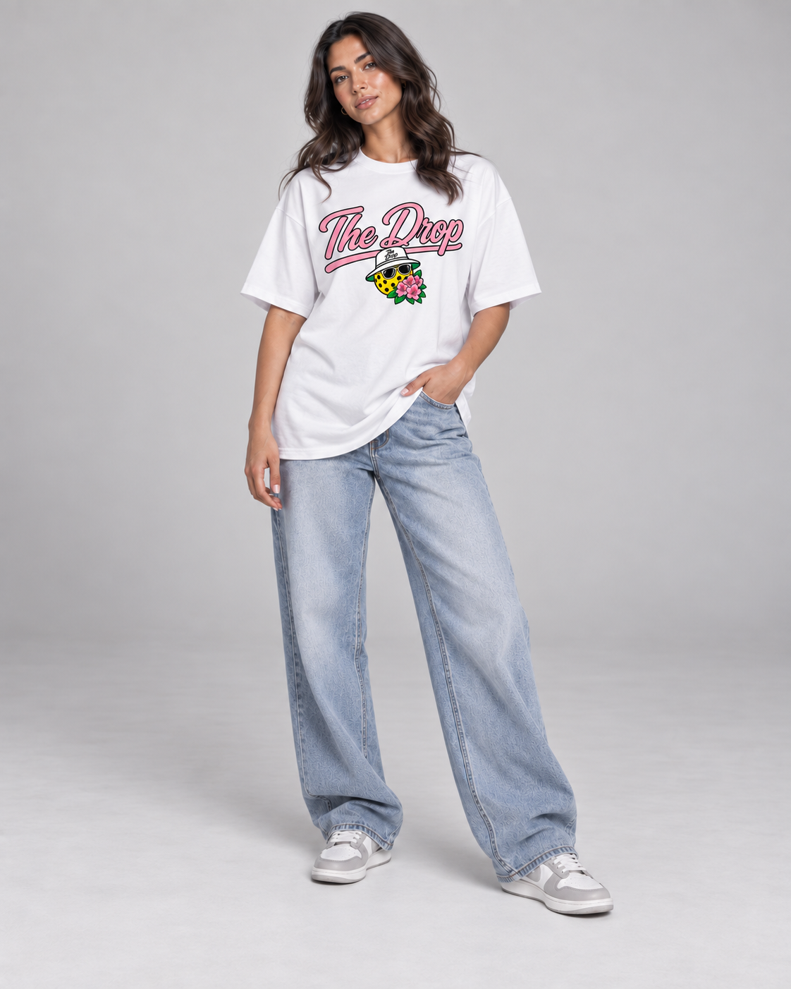 The Drop White Tee with pink script — single model front view