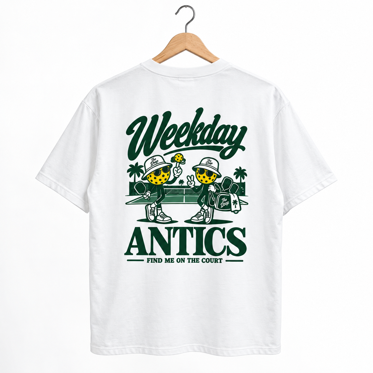 Weekday Antics Tee on a wooden hanger, back view